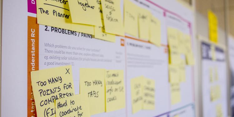 Post-its on whiteboard